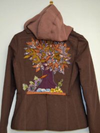 Designer women's jacket with applique tree