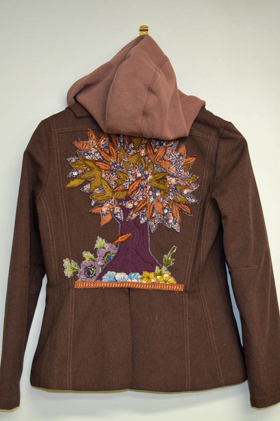 Designer women's jacket with applique tree