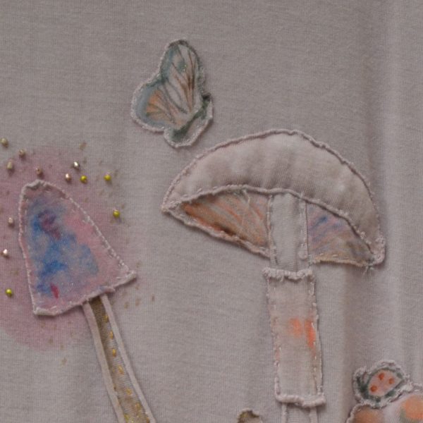 embroidered t shirt moth landing on mushroom