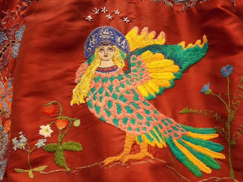 Anastasia gifts the Red Dress with a Serene bird